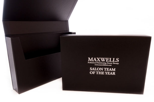 Black cloth over board box folder to take A4 documents with silver foil blocked lettering
